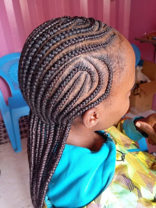 Back cornrows hairstyle by Blessed Rayna Salon